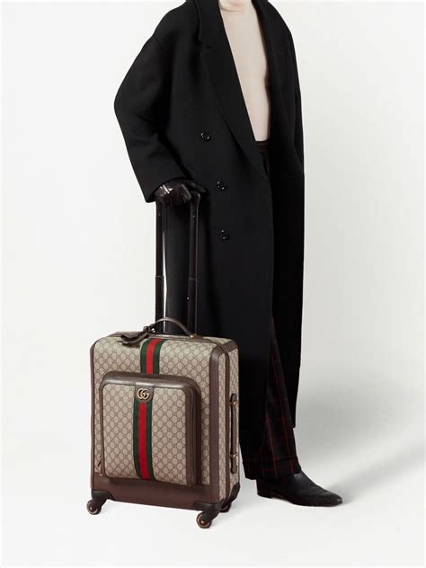 farfetch Gucci suitcase